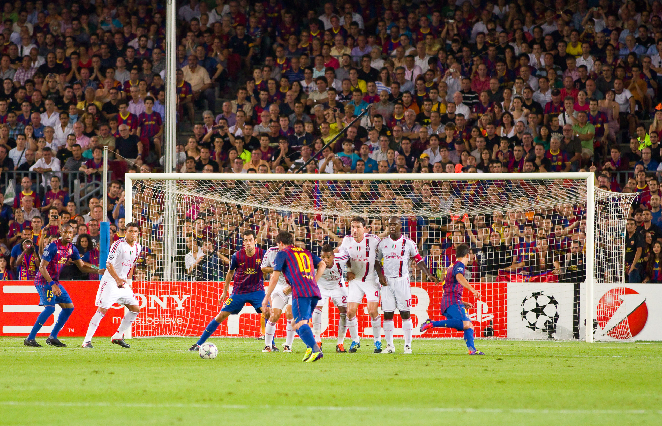 Best soccer free kick taker Lionel Messi shooting a soccer free kick